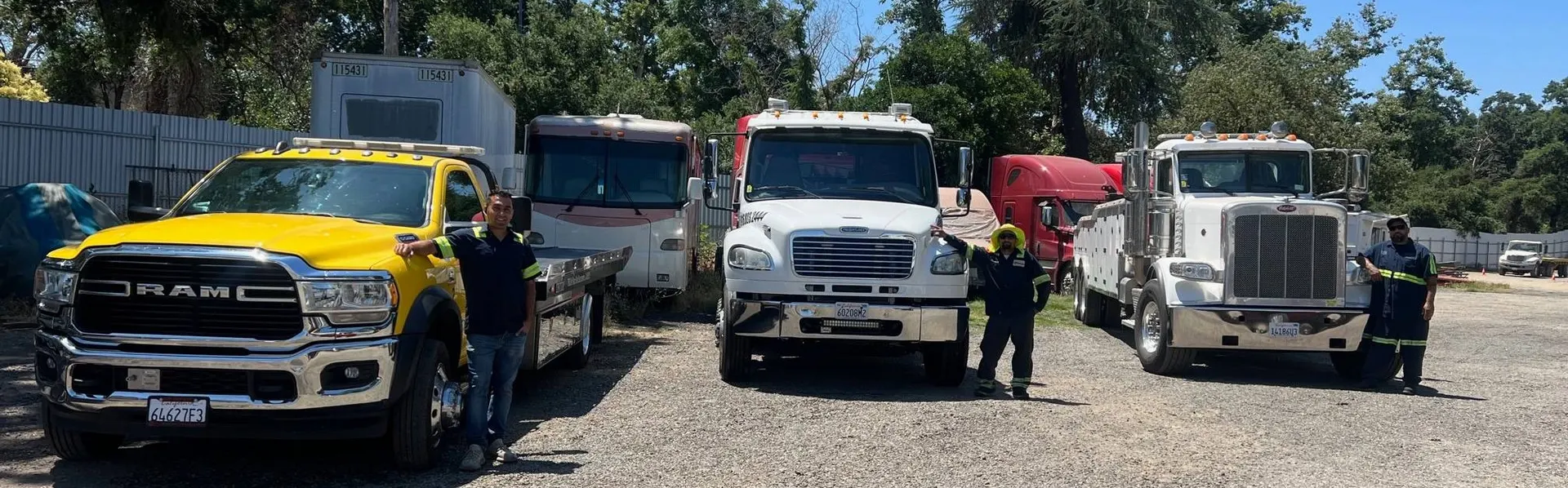 Alpha Brothers Towing team and fleet trucks lined up in Sacramento, CA