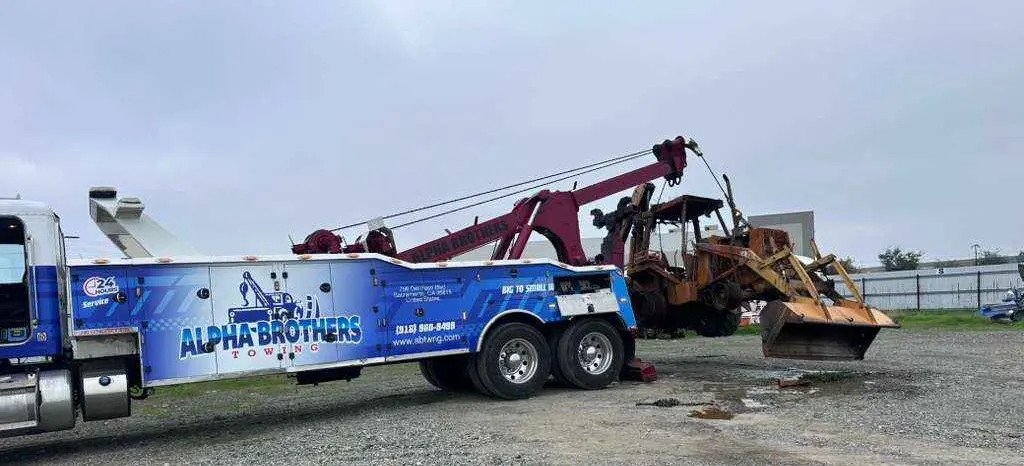 Alpha Brothers heavy machinery towing — excavators, dozers and industrial equipment transport in Sacramento